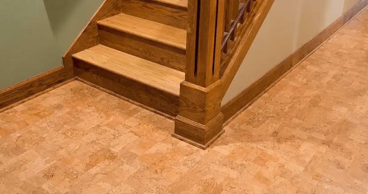 End of a staircase with cork flooring in Syracuse, NY