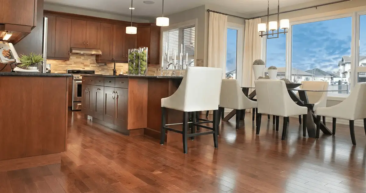 A modern kitchen with professionally installed wood flooring in Syracuse, NY