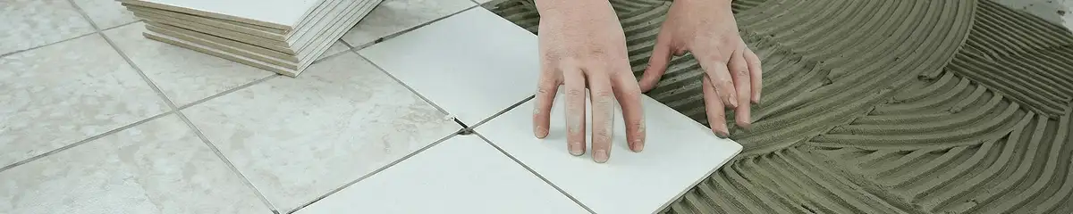 Professional installing white tile floors in Syracuse, NY
