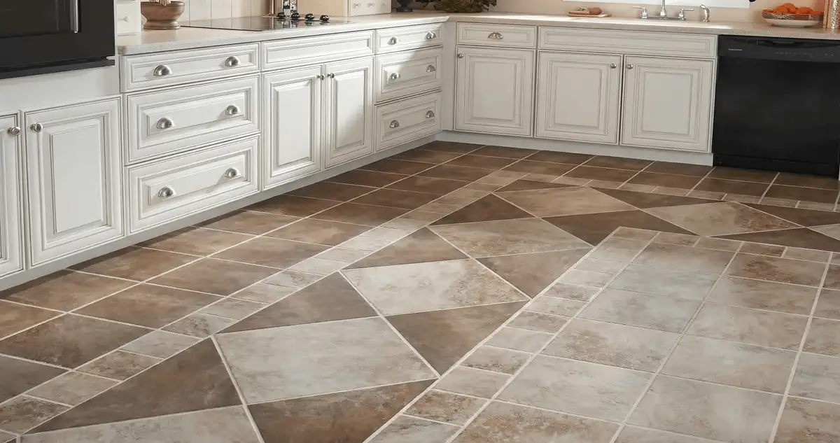 Kitchen with white cabinets and a professionally installed tile floor in Syracuse, NY