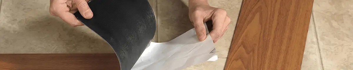 A professional installing vinyl flooring in Syracuse, NY